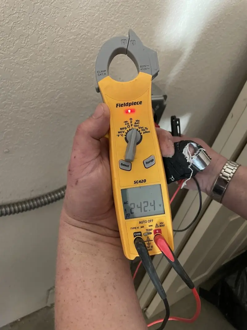 Voltage testing with clamp meter during Hot Tub / Pool Electrical Wiring in Topsham